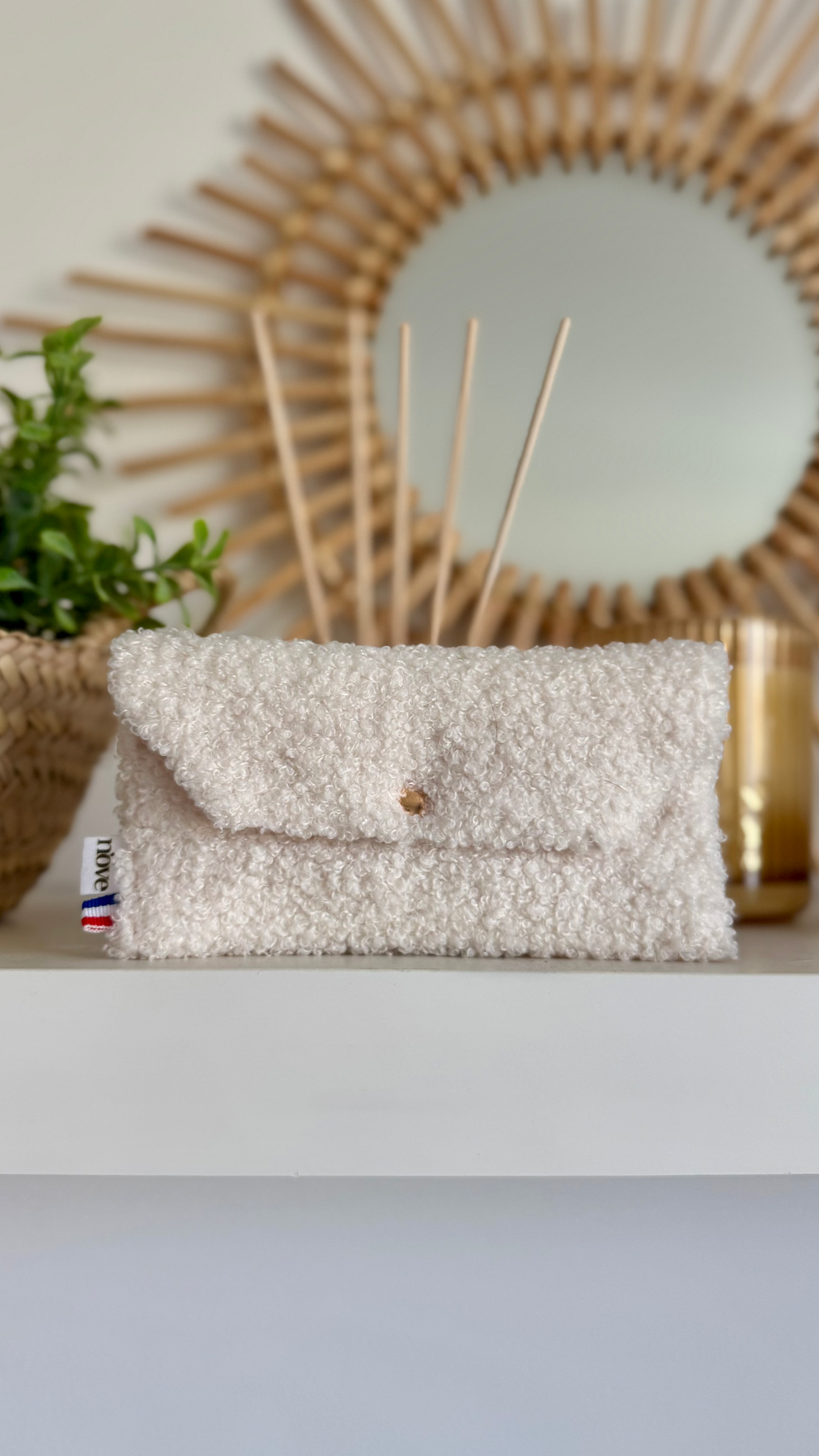 Pochette longue matelassée à pression