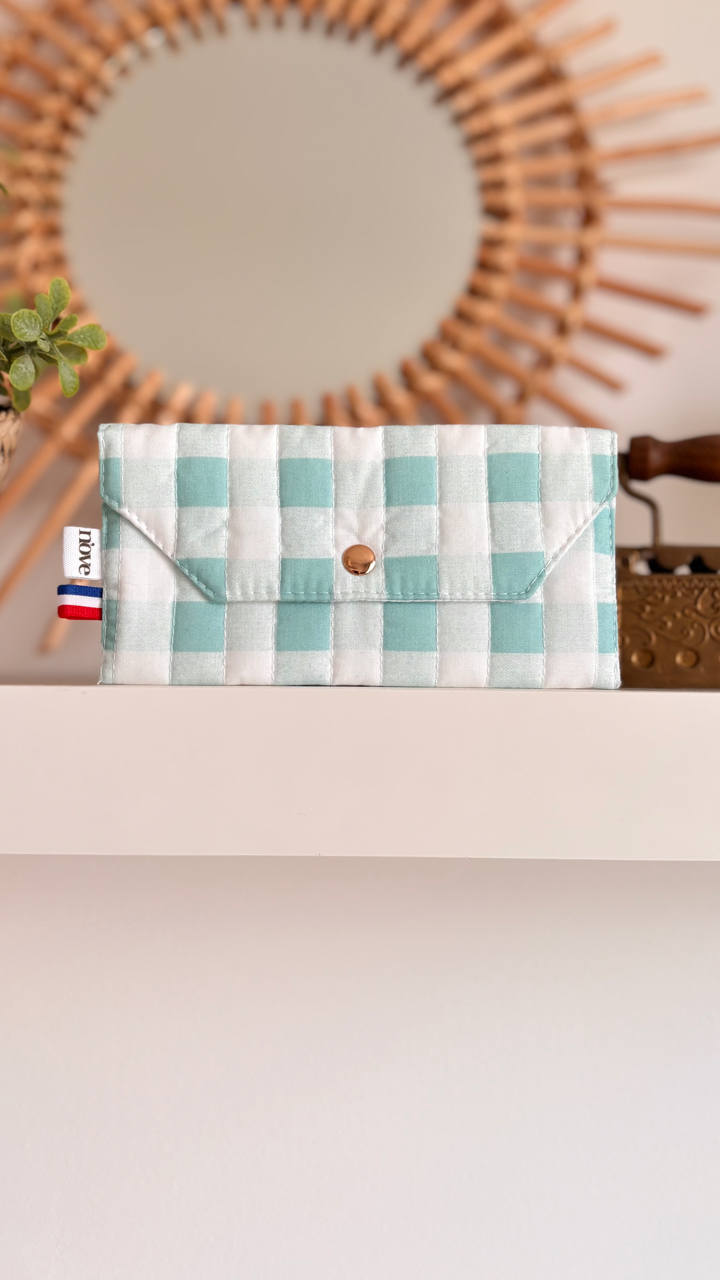 Pochette matelassée à pression