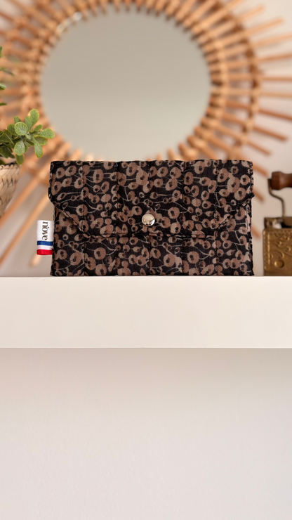 Pochette matelassée à pression