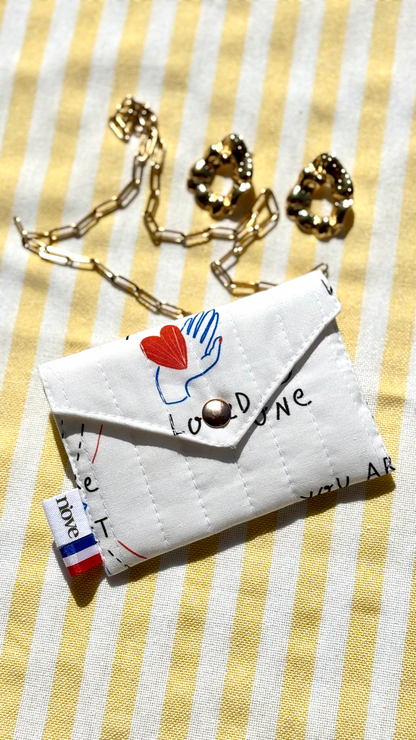 Mini pochette matelassée à pression