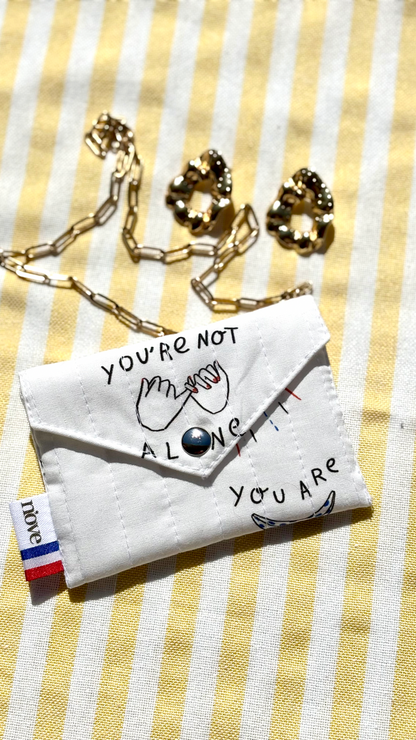 Mini pochette matelassée à pression