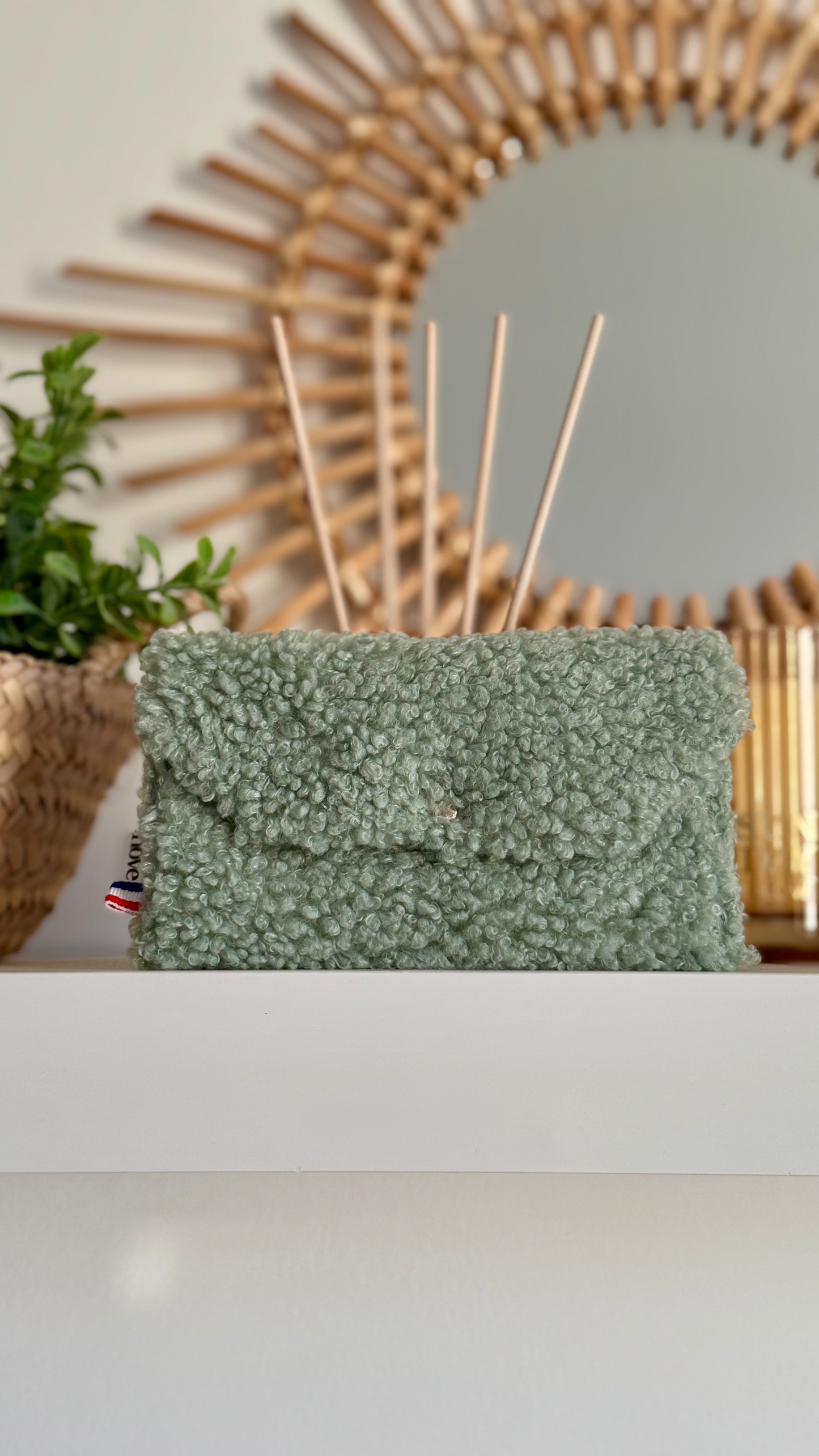 Pochette longue matelassée à pression